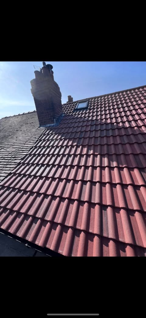 New red roof tiles and finished chimney details